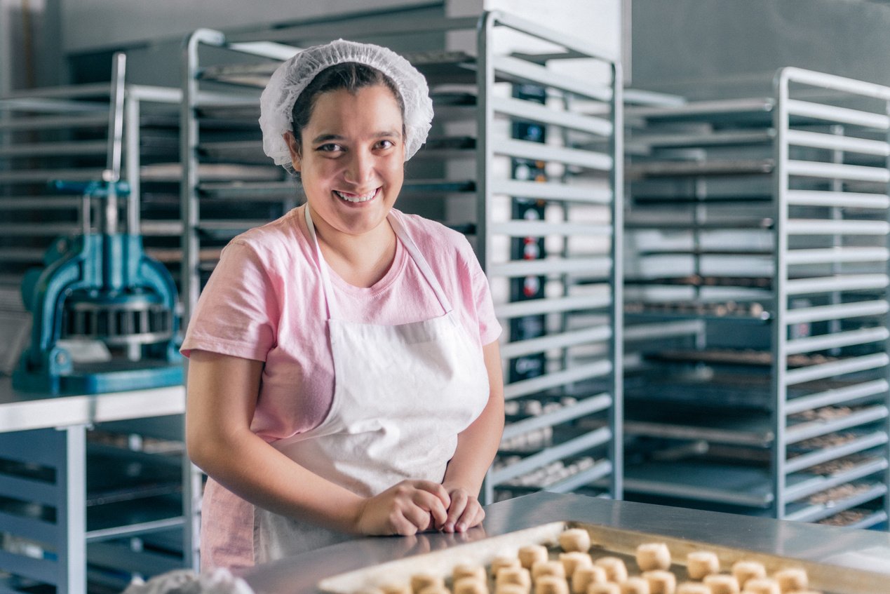 Volunteer with intelectual disability working at Bakery Workshop