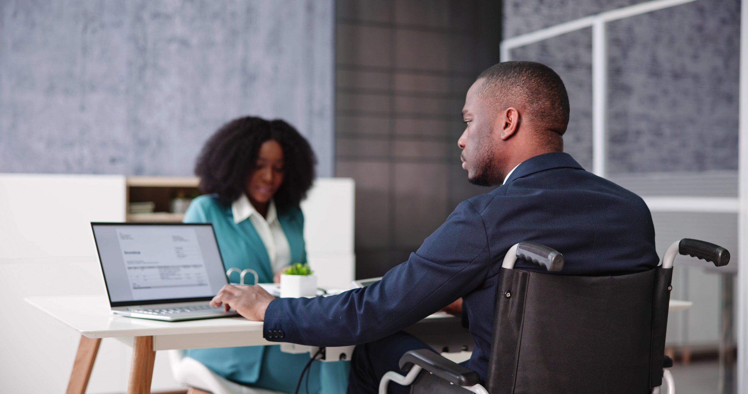 People Working At Office Desk